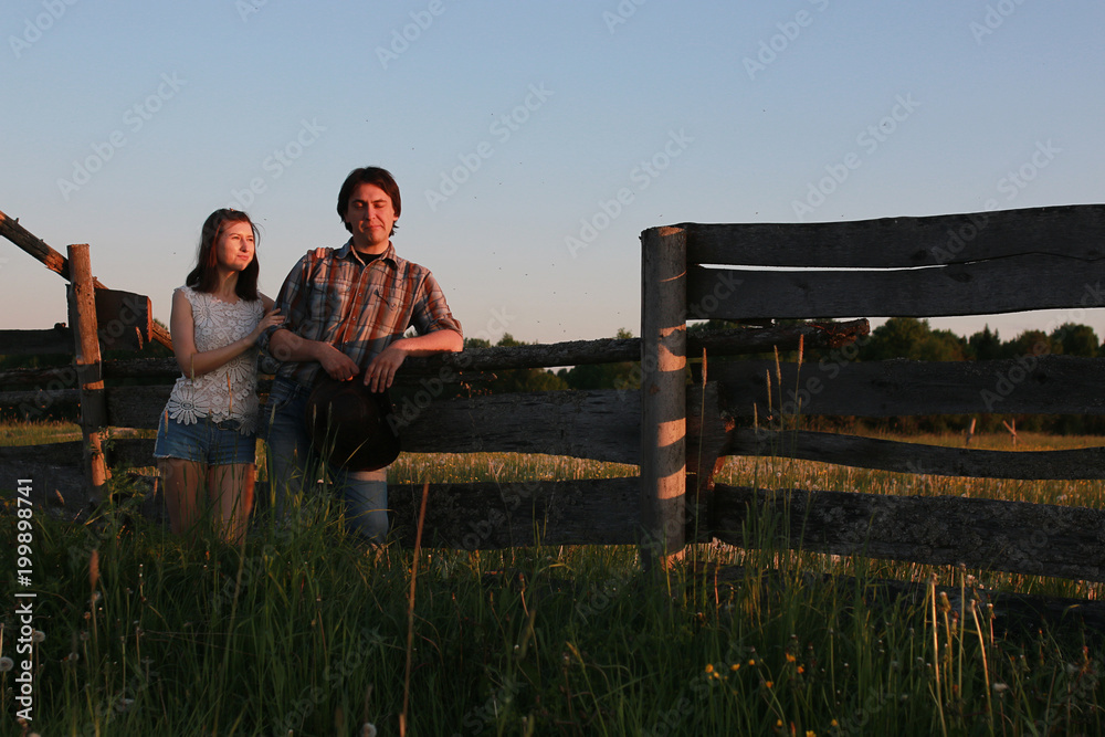 Cute couple on a walk by the countryside