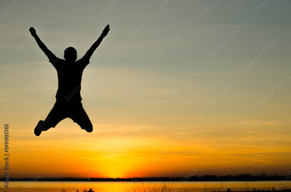 Men silhouette jumping happily. Men silhouette jumping happily.