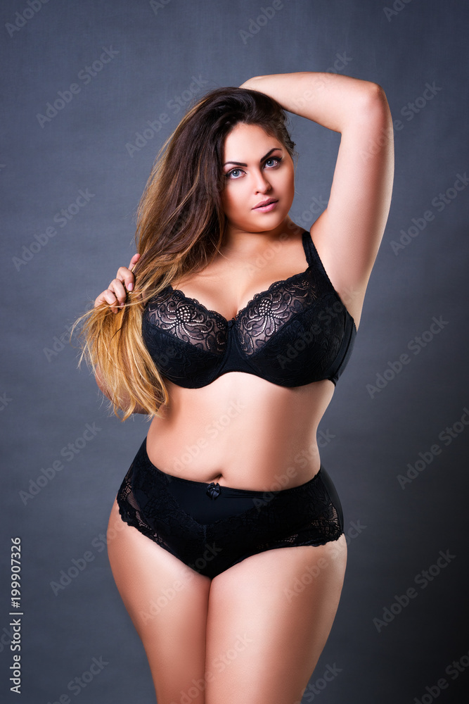 Plus size sexy model in black underwear, fat woman on gray studio  background, overweight female body Stock Photo | Adobe Stock