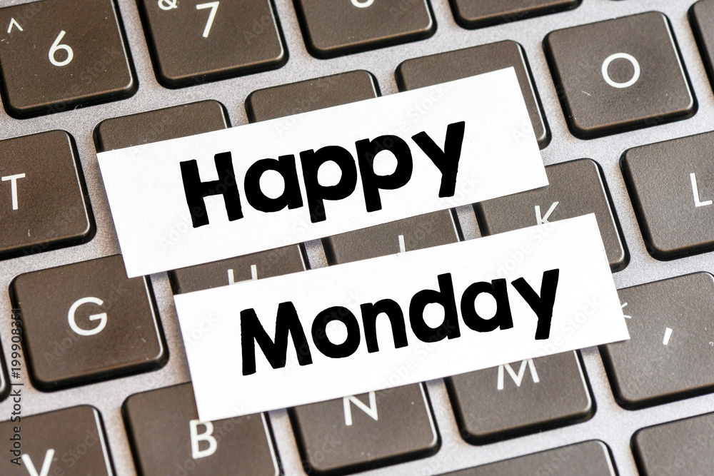 Closeup of laptop keyboard buttons with symbols and text Happy Monday Closeup of laptop keyboard buttons with symbols and text Happy Monday