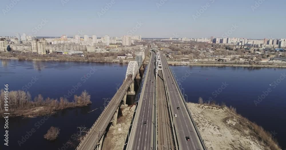 Aerial view of the city traffic on the bridge. Darnitskiy bridge, Kiev, Ukraine Aerial view of the city traffic on the bridge. Darnitskiy bridge, Kiev, Ukraine