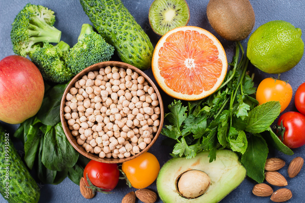 Top view and Close-up of Healthy Food Clean Concept. Raw fruits, Vegetables, Nuts, Cereals on Concrete Stone Table Background. Top view and Close-up of Healthy Food Clean Concept. Raw fruits, Vegetables, Nuts, Cereals on Concrete Stone Table Background.