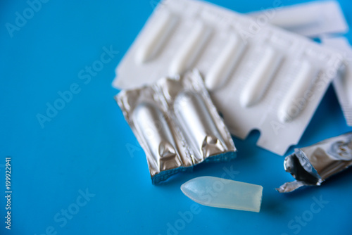 Suppository pack on blue background