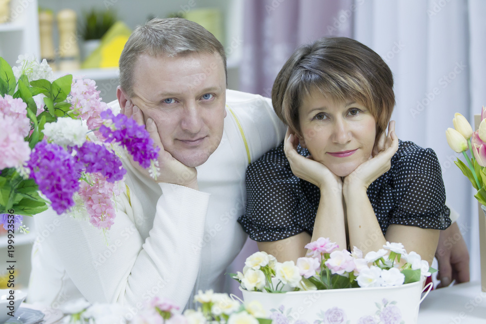 Husband and wife. Happy elderly couple. Love of middle age. A middle-aged man and a middle-aged woman. Husband and wife. Happy elderly couple. Love of middle age. A middle-aged man and a middle-aged woman.