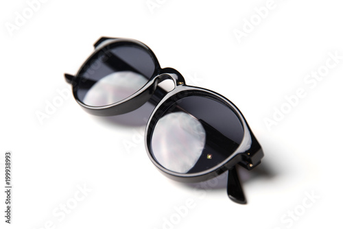 Stylish black sunglasses isolated on white background
