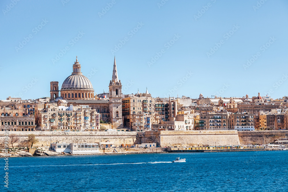 Sea view of Valletta city - the capital of Malta with Basilica of Our Lady of Mount Carmel in Valletta, Malta.