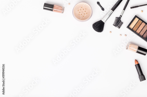 set of professional decorative cosmetics, makeup tools and accessory on white background with copy space for text. beauty, fashion, party and shopping concept. flat lay composition, top view