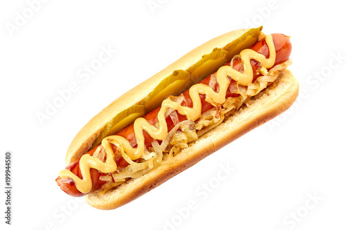 Hot dog with fried onion and cucumbers on white