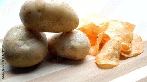 Wallpaper Mural Rotating portion of Potato Chips. White background. 4K Torontodigital.ca