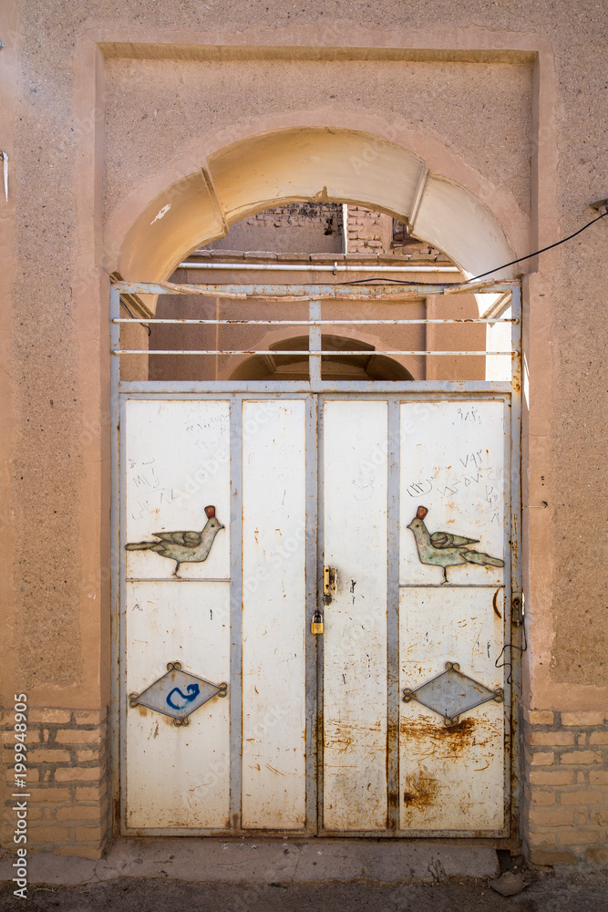 Naklejka premium An Old Door in Khusf, Khorasan, Iran