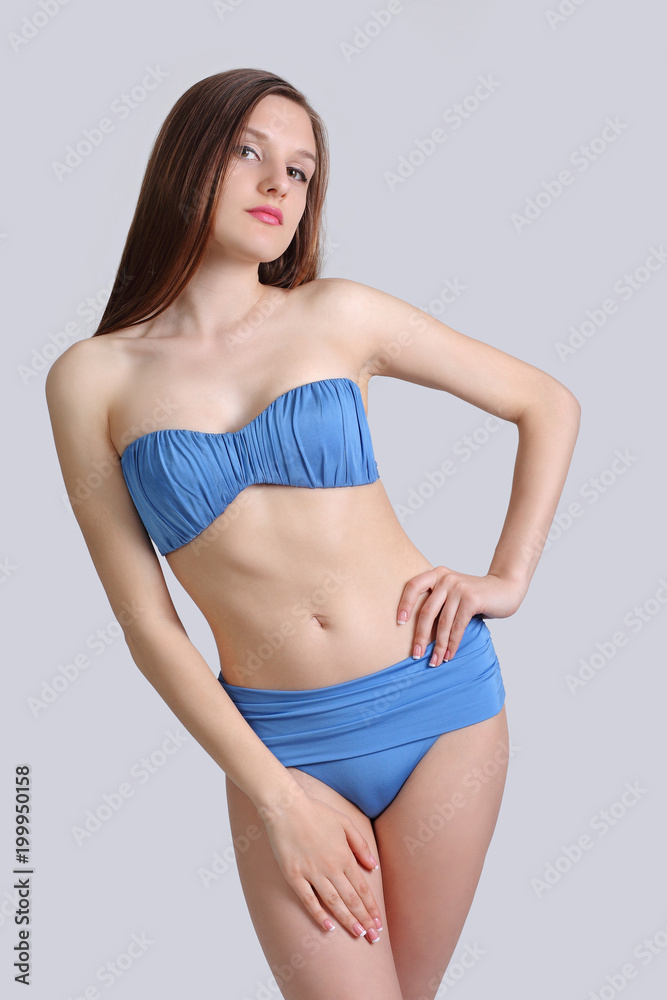 Fototapeta premium young cute girl posing in bikini