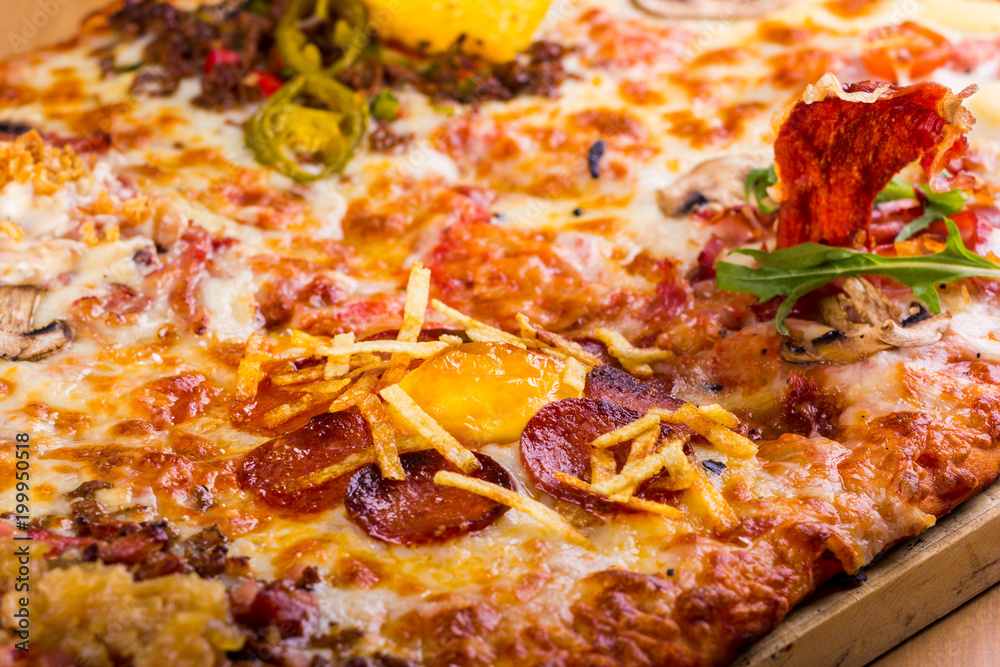 square pizza with many different ingredients square pizza with many different ingredients