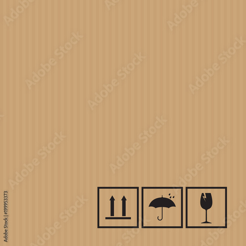 Packaging symbols on cardboard background