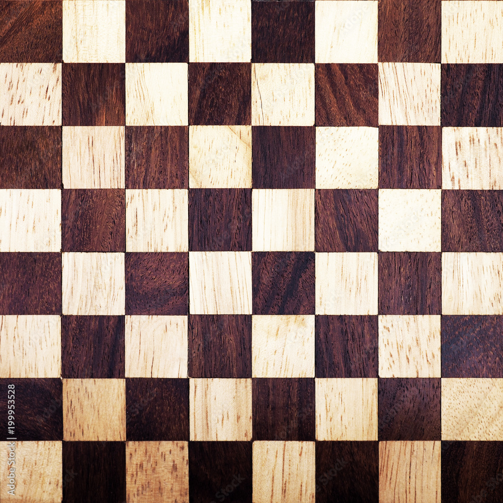 Foto Stock Wooden chess board background. Vintage chess board texture.  White and black squares for popular game | Adobe Stock
