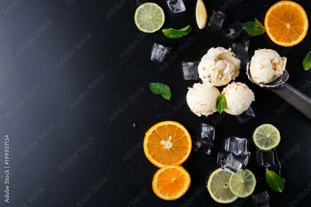 Ice cream scoops with ice on black background Ice cream scoops with ice on black background