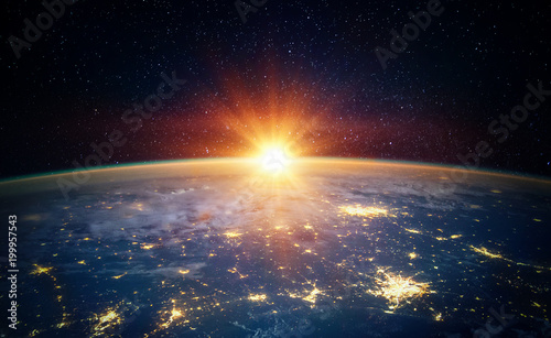 Earth, sun, star and galaxy. Sunrise over planet Earth, view from space. Elements of this image furnished by NASA