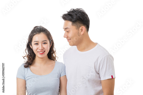 Portrait of young couple. Happy Asian couple studio shot.