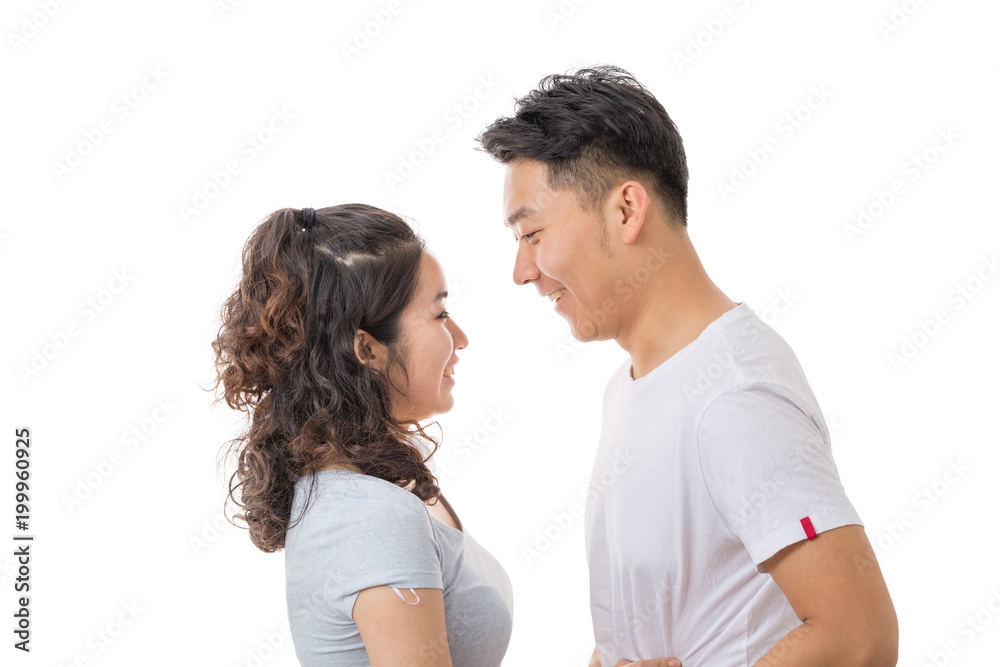 Happy young Asian couple looking at each other. Face to face Happy young Asian couple looking at each other. Face to face