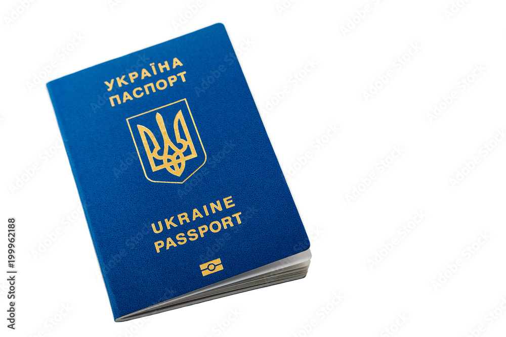 New ukrainian blue international biometric passport with identification chip and fingerprints isolated on white with copy space. Selective focus New ukrainian blue international biometric passport with identification chip and fingerprints isolated on white with copy space. Selective focus