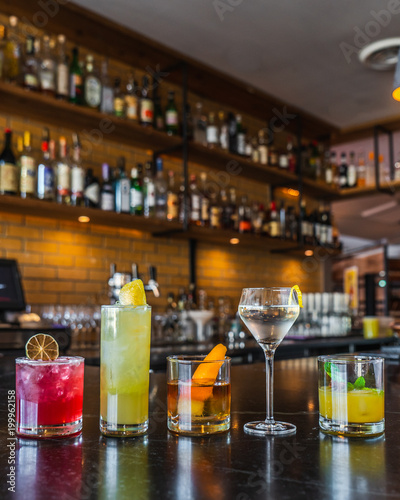 Drinks on a bar with bottles