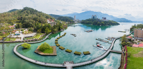Panorama landscape view of Sun Moon Lake with sunrise sky dawn morning, the most famous tourist attraction in Taiwan. photo