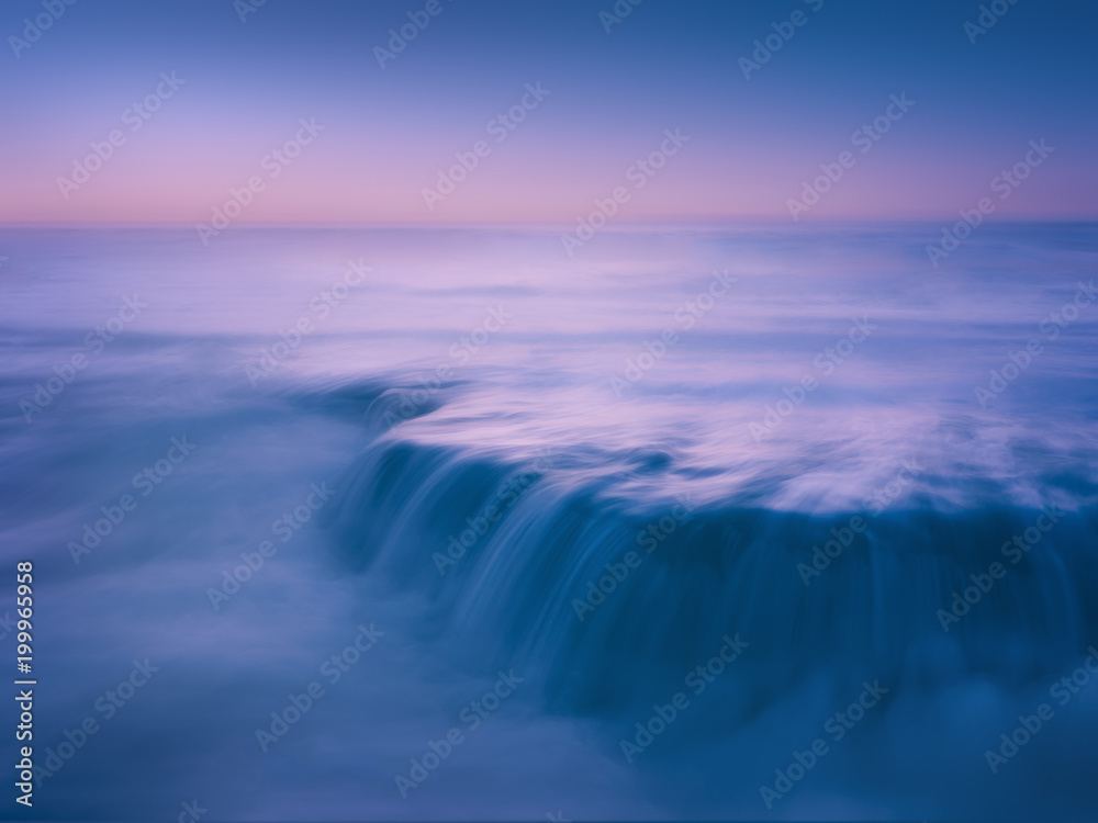 Fototapeta premium dreamy and beautiful seascape with rock and long exposure on beach