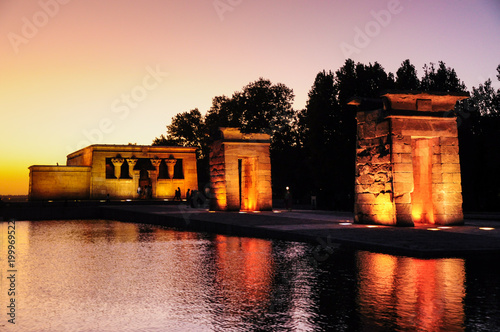 Illuminated Temple of Debod seen at the sunset. Ancient Egyptian temple that was dismantled and rebuilt in Madrid, Spain. Donated in 1968 and rebuilt in Parque del Oeste, near the Royal Palace