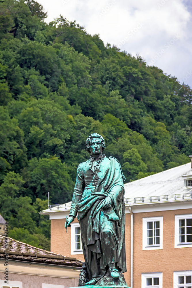 The statue of Mozart in the Mozart Square in Salzburg, Austria . Sculptor Ludwig von Schwanthaler, 1842