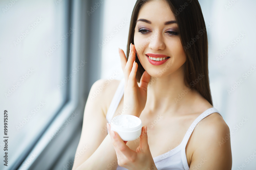 Beauty Face Care. Woman Applying Cream On Skin. Beauty Face Care. Woman Applying Cream On Skin.