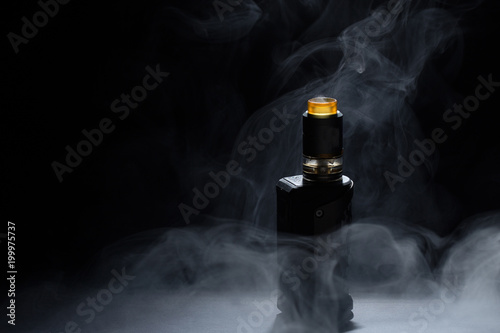 vape close-up in a smoke on a black background