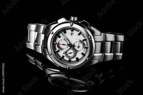 Luxury watch isolated on a black background with reflection. High quality. Highclass.