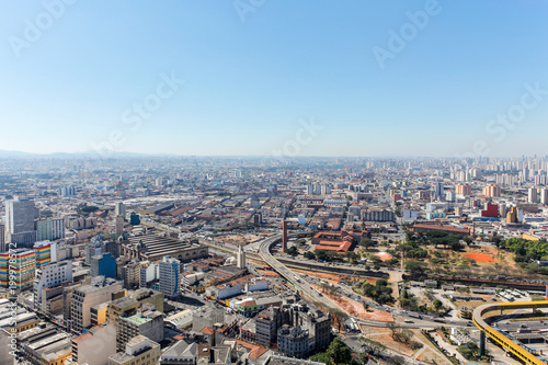 Cityscape of "São Paulo" with blue sky.