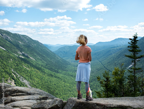Girl hiking with great view.