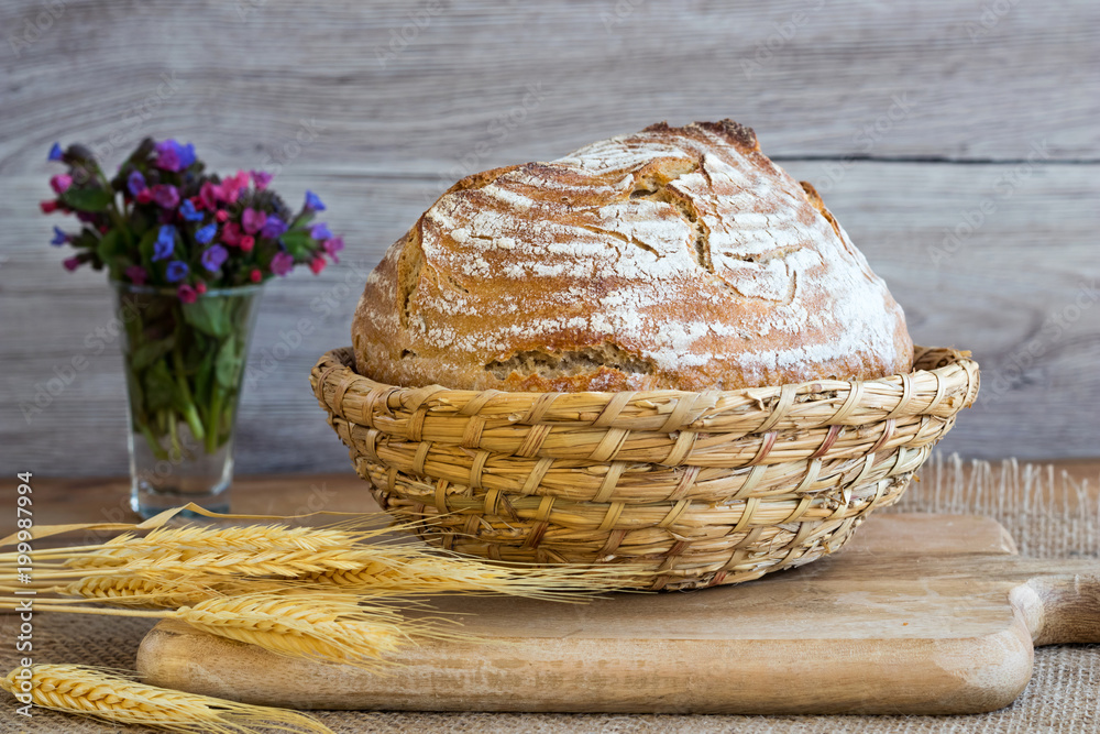 Sourdough bread in a basket on a table