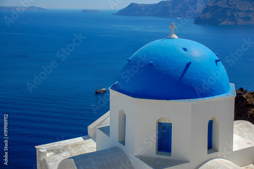 Blue domed churches on the Caldera at Oia on the Greek Island of Santorini