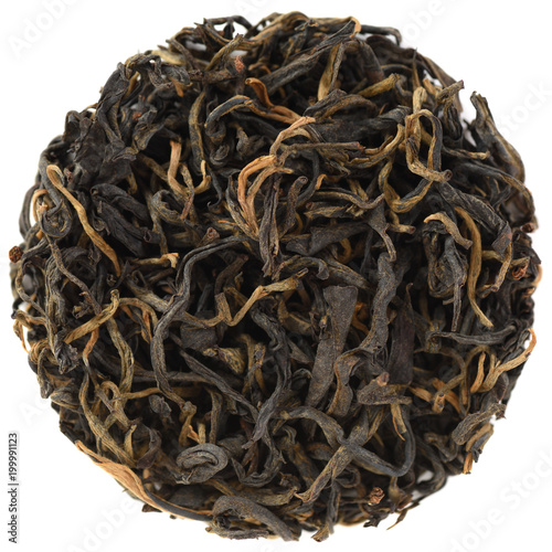 Nan Nuo Mountain Assamica Varietal Black Tea in round shape isolated photo