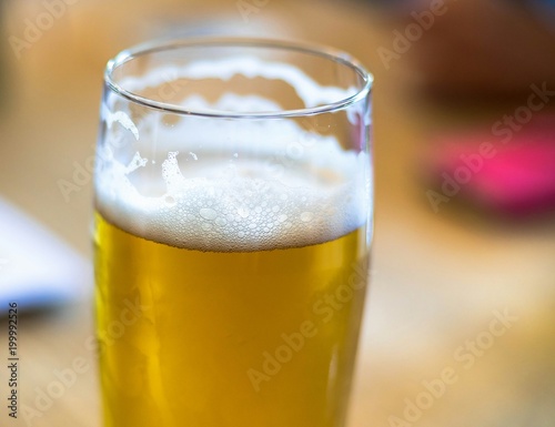 A glass of light beer