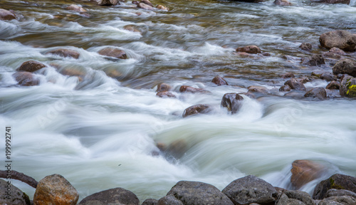 long exposure of river from water fall at yosemite 