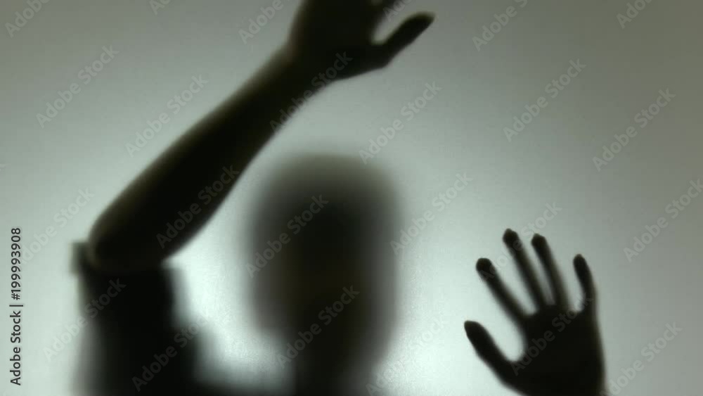 silhouette of hand on mirror,Horror movie concept silhouette of hand on mirror,Horror movie concept