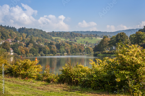 a view of river Necker on a sunny autumn day in Heidelberg, Germany photo