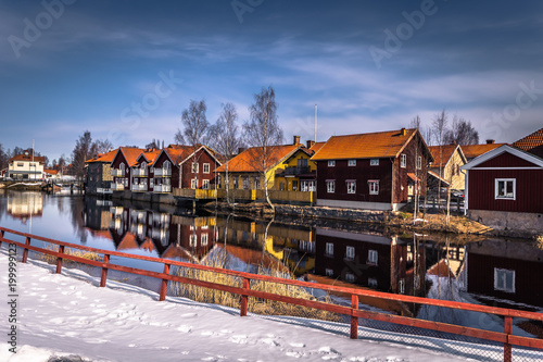 Falun - March 30, 2018: The picturesque wooden houses in the center of the town of Falun in Dalarna, Sweden photo