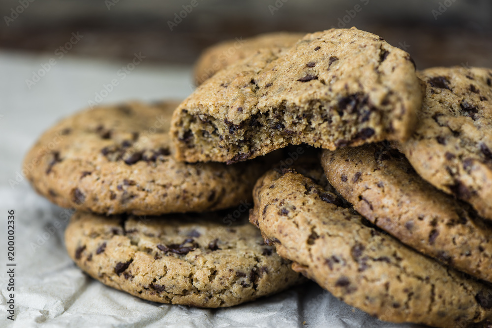 Freshly Baked Chocolate Cookies on Baking Paper. Sweet Biscuits. Homemade pastry. Freshly Baked Chocolate Cookies on Baking Paper. Sweet Biscuits. Homemade pastry.