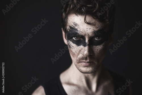 The guy with dark background and emotions
