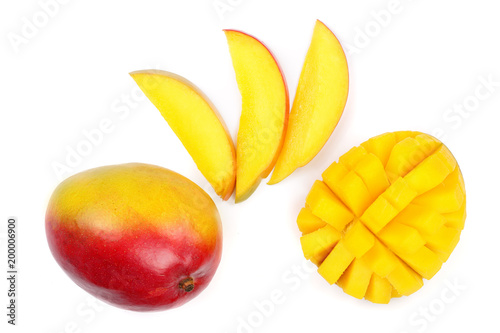 Mango fruit and slices isolated on white background close-up. Top view. Flat lay