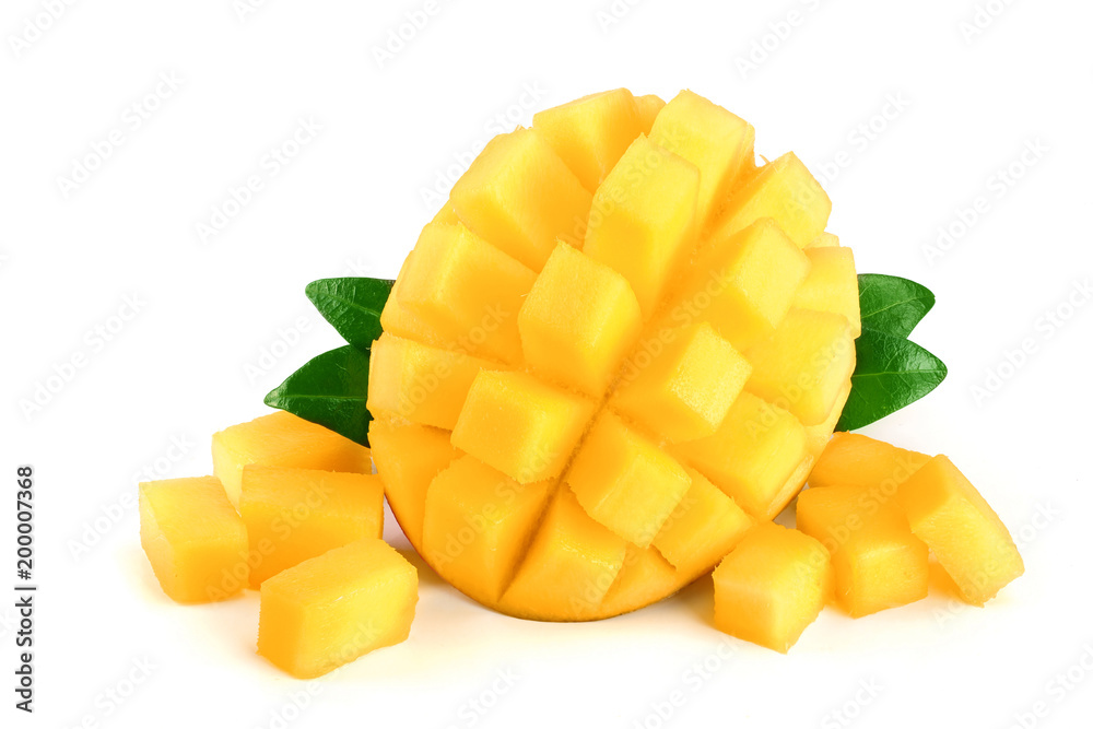 Mango fruit half with leaves and slices isolated on white background close-up Mango fruit half with leaves and slices isolated on white background close-up