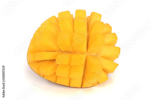 Mango fruit half isolated on white background close-up