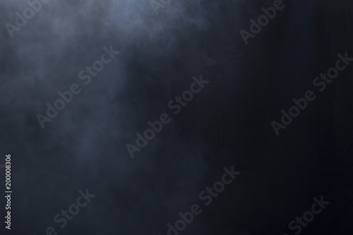 Fog/haze covers left side of screen over a black background