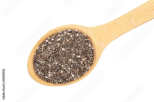 Chia seeds in wooden spoon isolated on white background. Top view