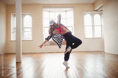 Pretty woman practising hip hop dance