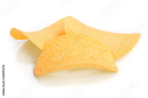 three potato chips on white background close-up